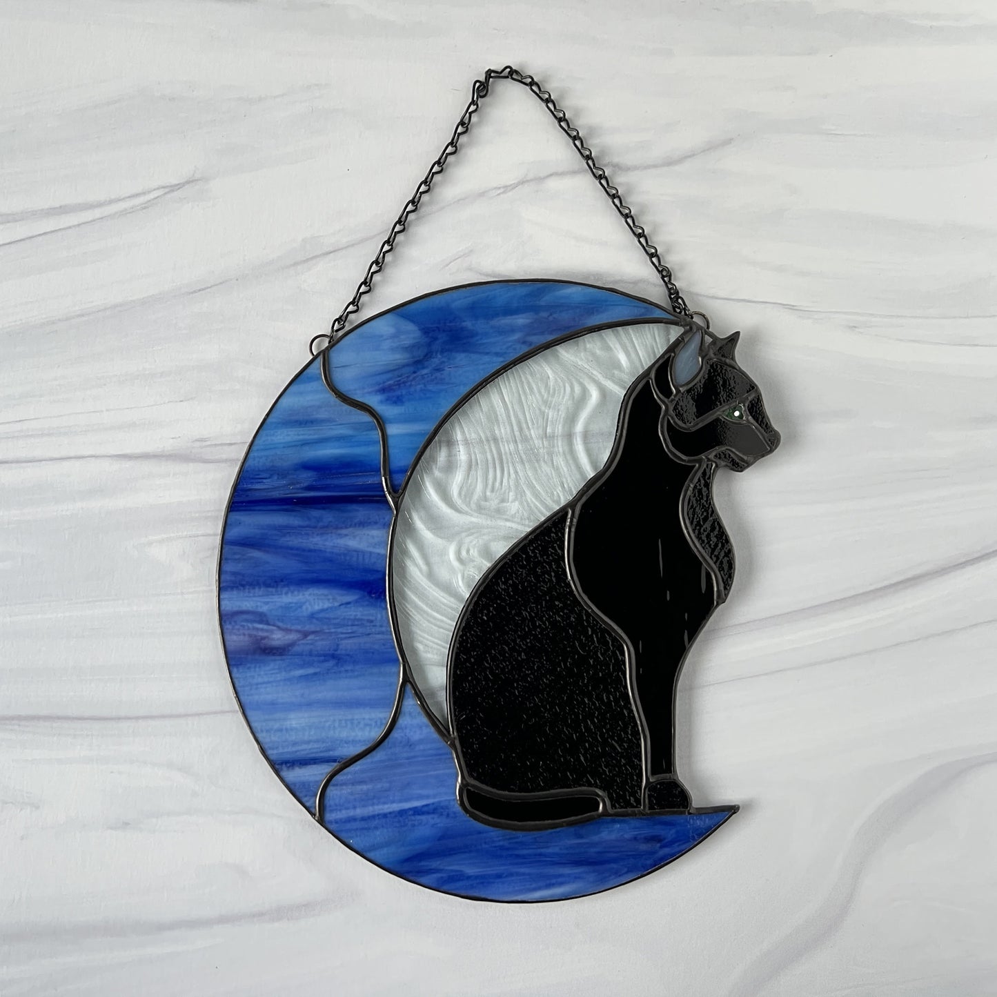 Black Cat on a Blue Moon