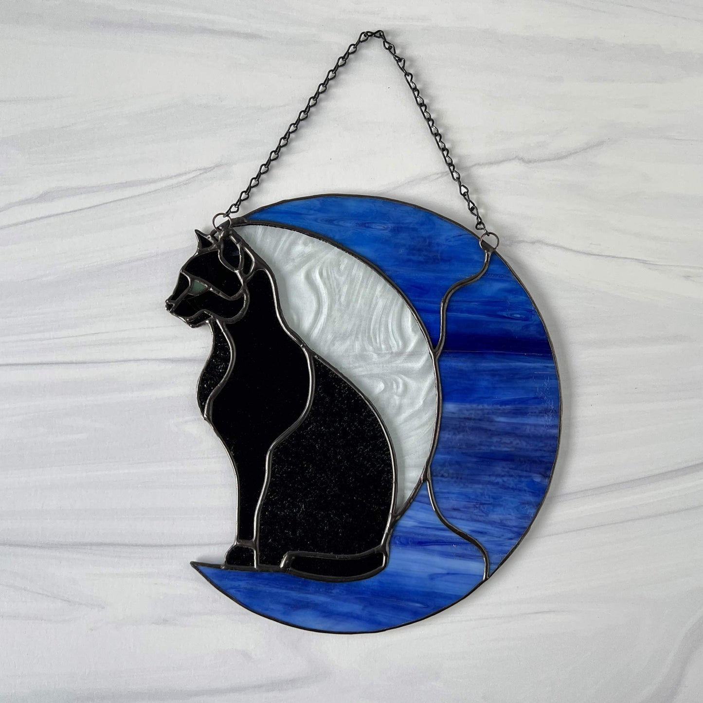 Black Cat on a Blue Moon
