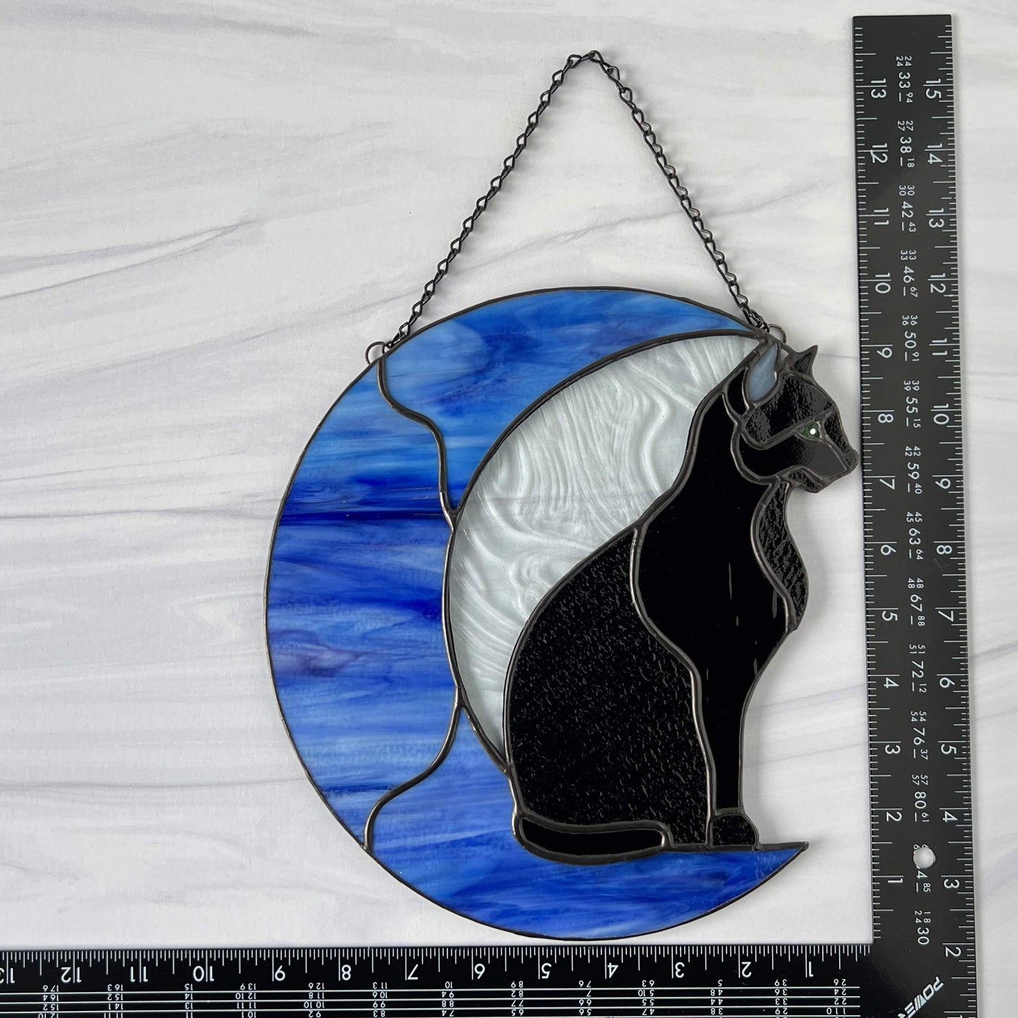 Black Cat on a Blue Moon