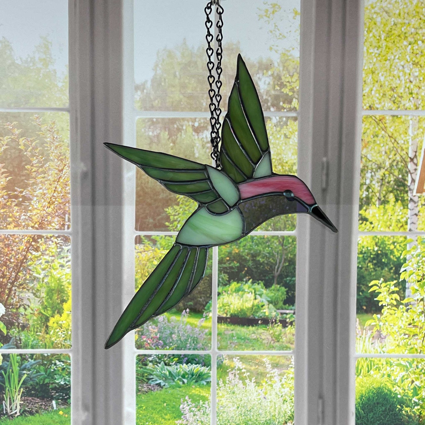 Hovering Hummingbird in Greens, Pink, Purple