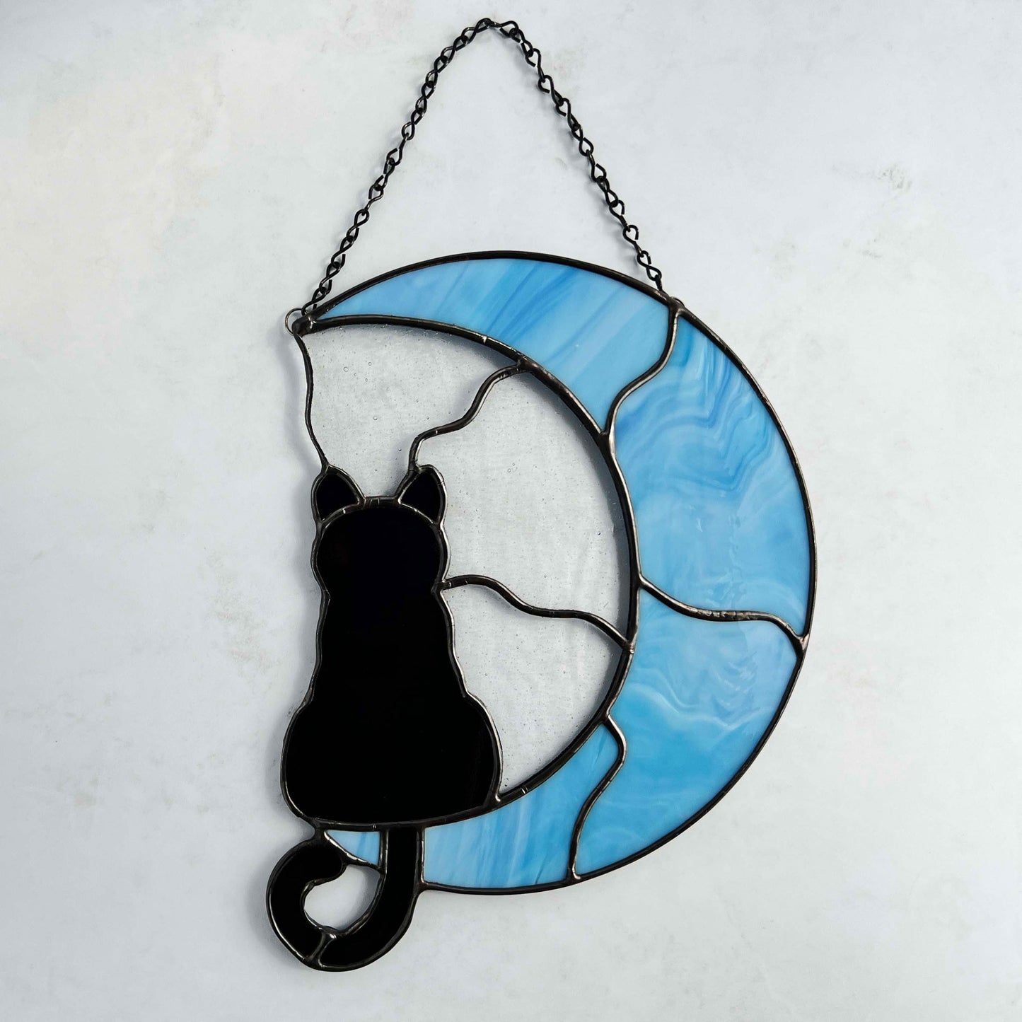 Cat on a Light Blue Moon