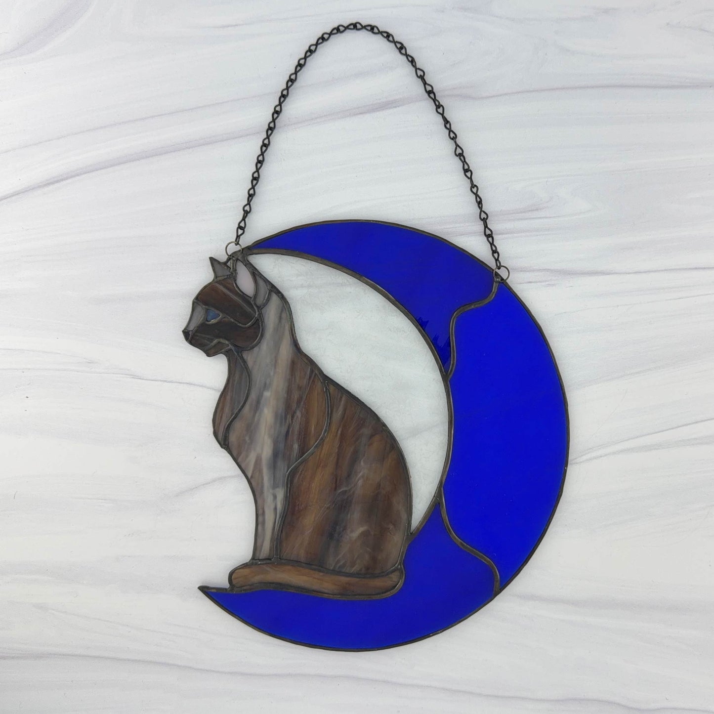 Cat on a Bright Blue Moon