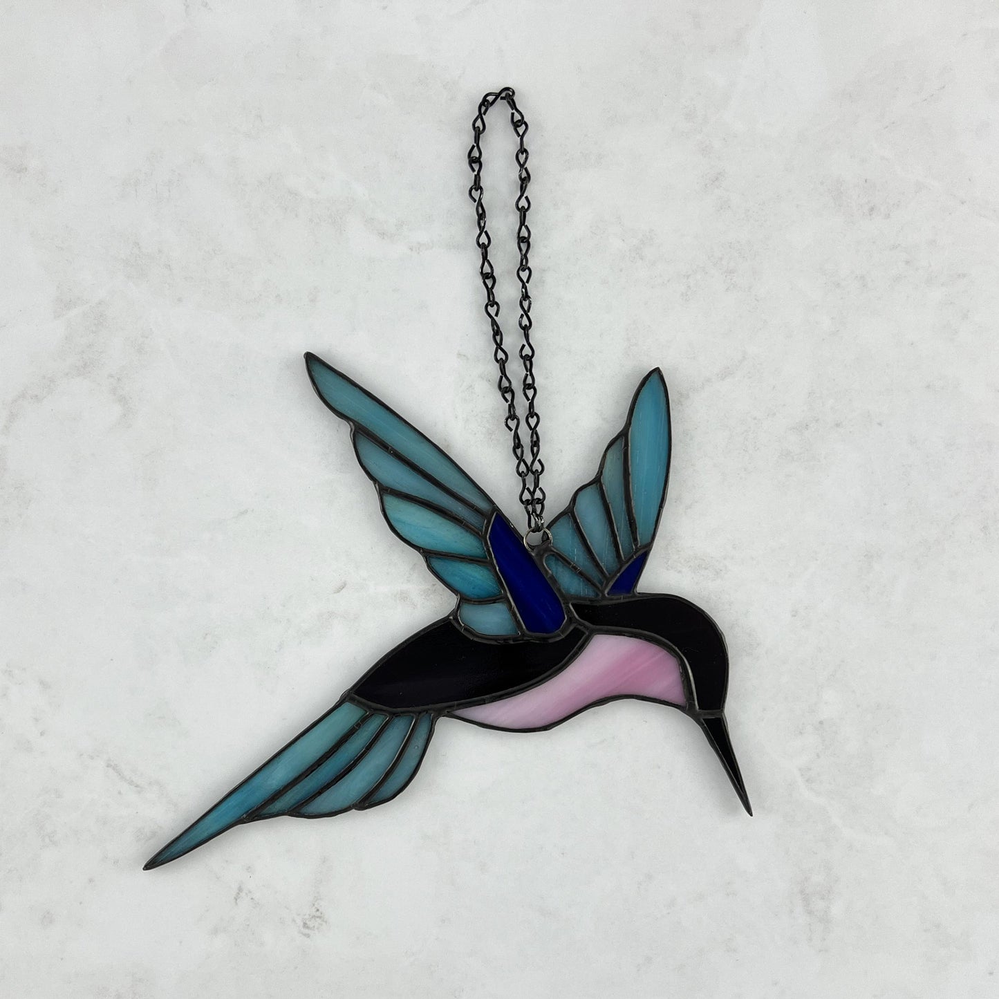 Hummingbird in Iridescent Blue, Purple, and Pink