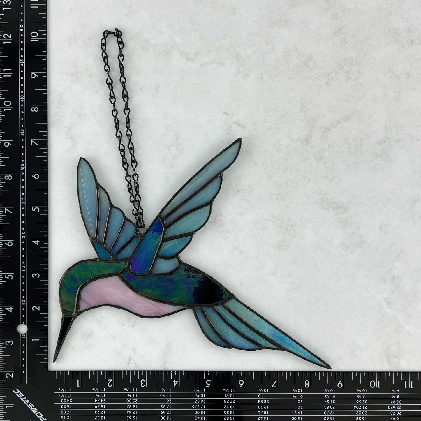 Hummingbird in Iridescent Blue, Purple, and Pink