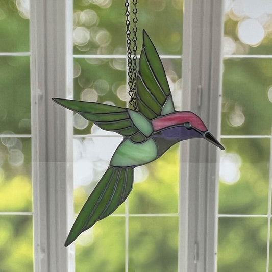 Hovering Hummingbird in Greens, Pink, Purple