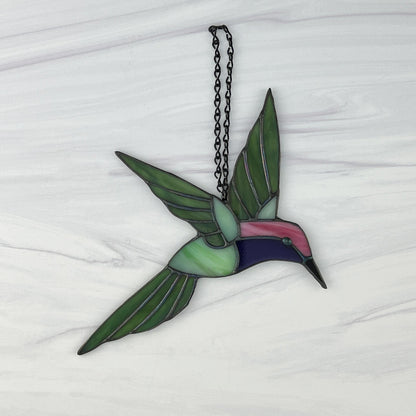 Hovering Hummingbird in Greens, Pink, Purple