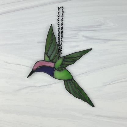 Hovering Hummingbird in Greens, Pink, Purple