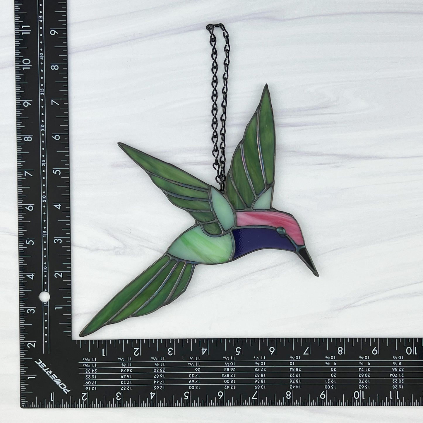 Hovering Hummingbird in Greens, Pink, Purple