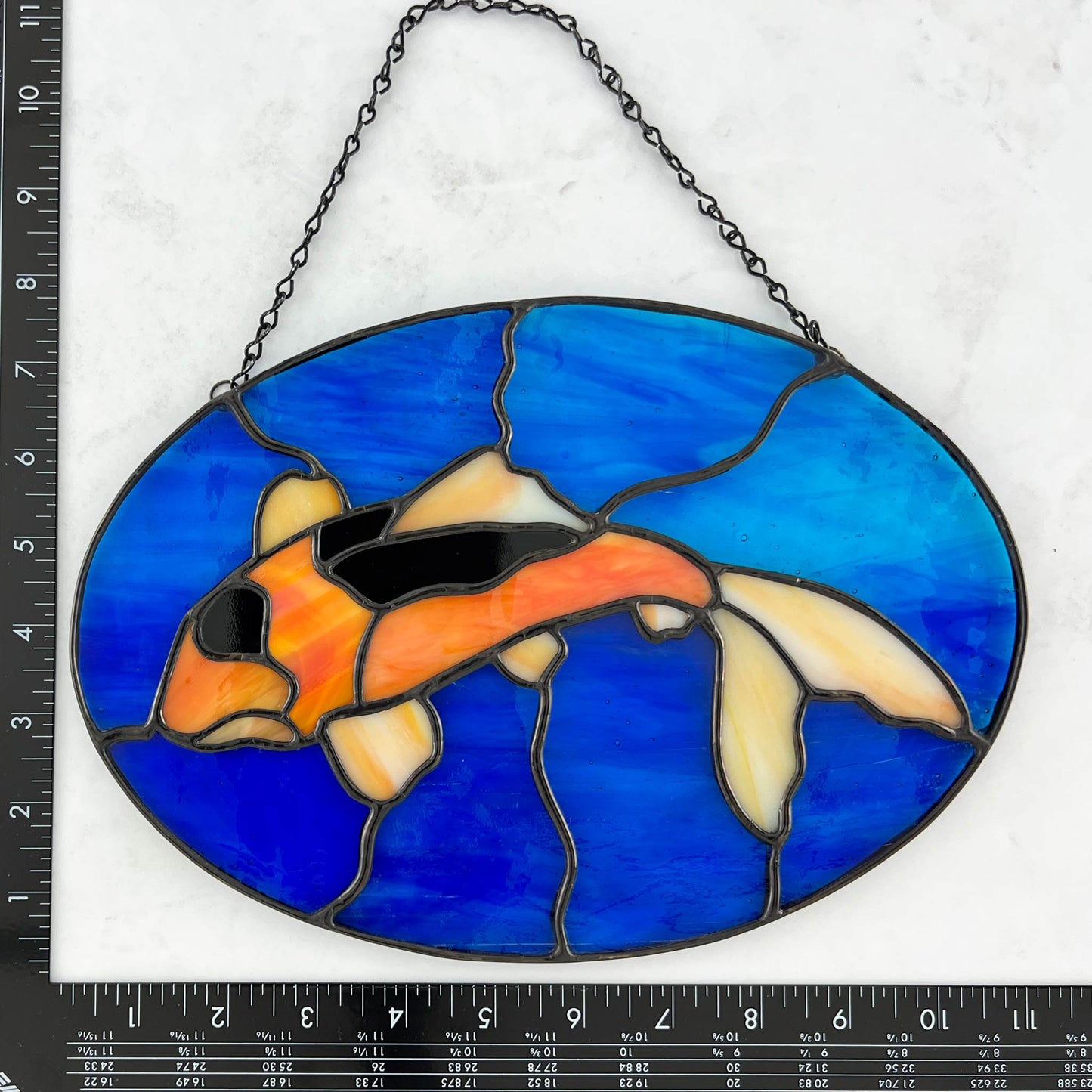 Koi Fish Swimming in a Pond of Blue