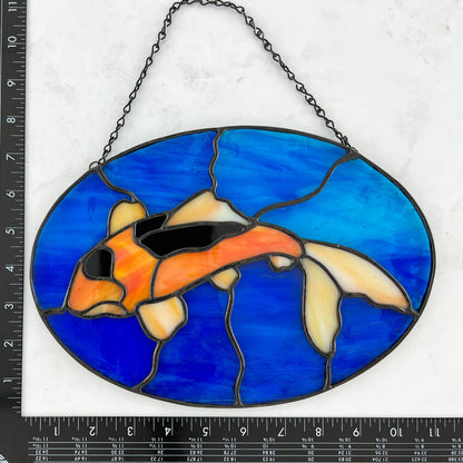 Koi Fish Swimming in a Pond of Blue