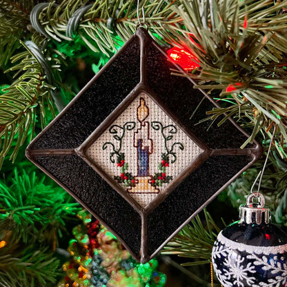 Christmas Candle Ornament with a Dark Blue Sparkle stained glass frame