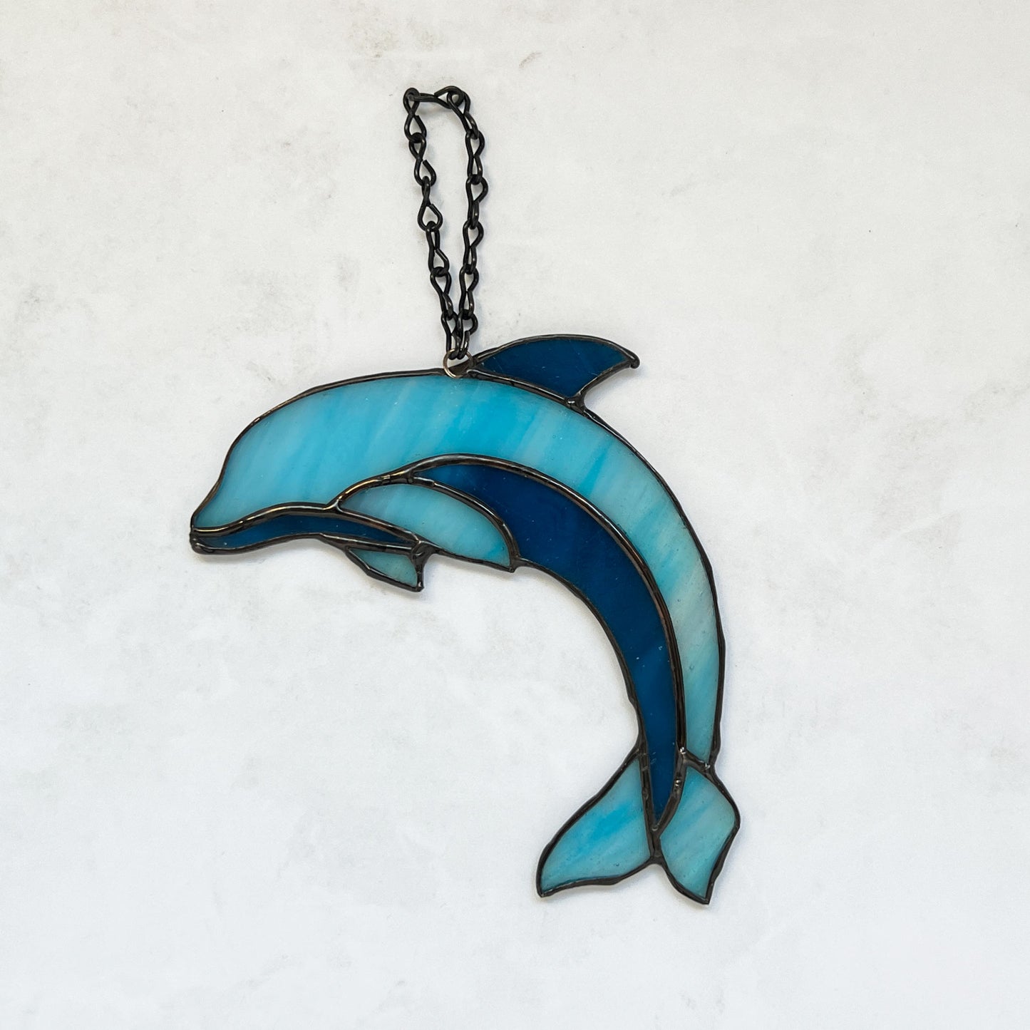 Dolphin in Iridescent and Dark Blue