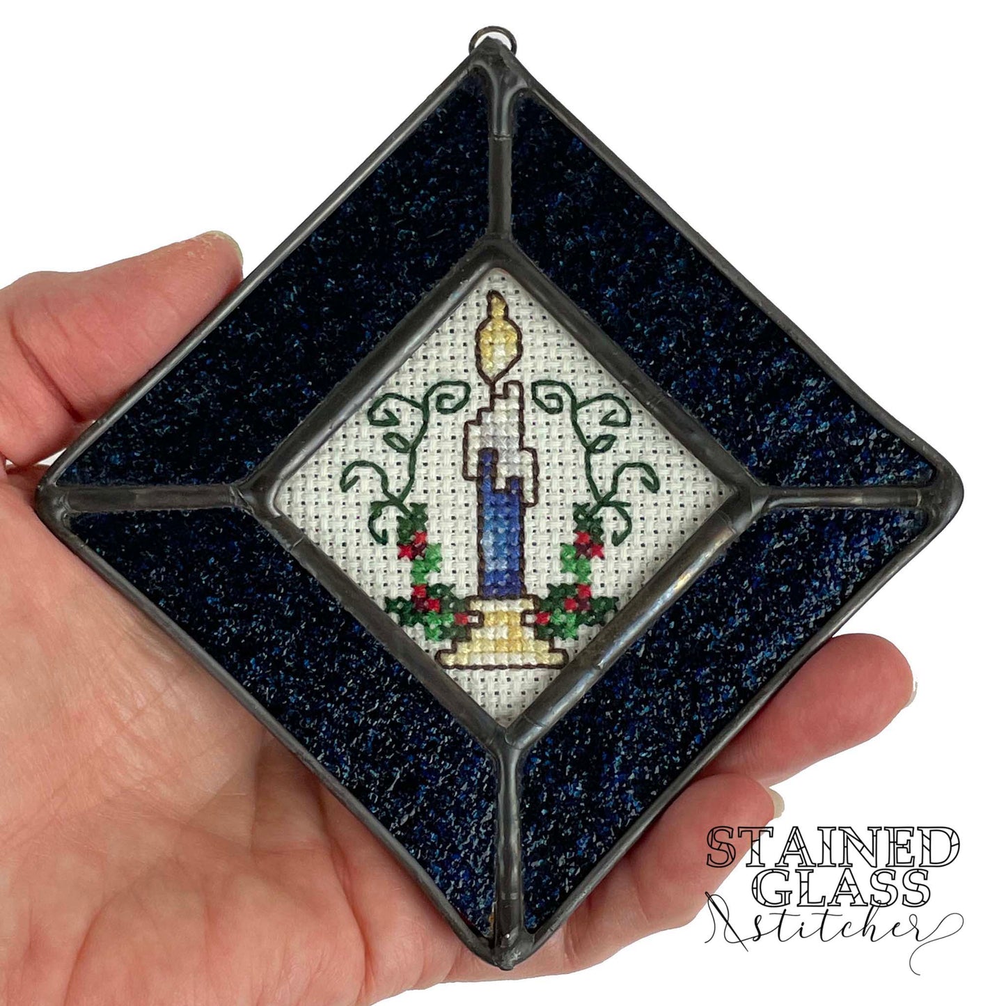 Christmas Candle Ornament with a Dark Blue Sparkle stained glass frame